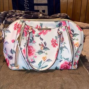 White and floral purse
